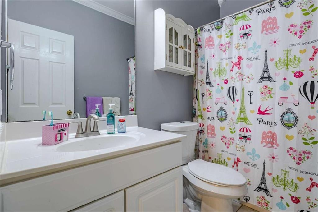 26 Saddlebrook Drive Rome, GA 30161 - Photo 37 of 63 a bathroom with a sink toilet and a shower curtain