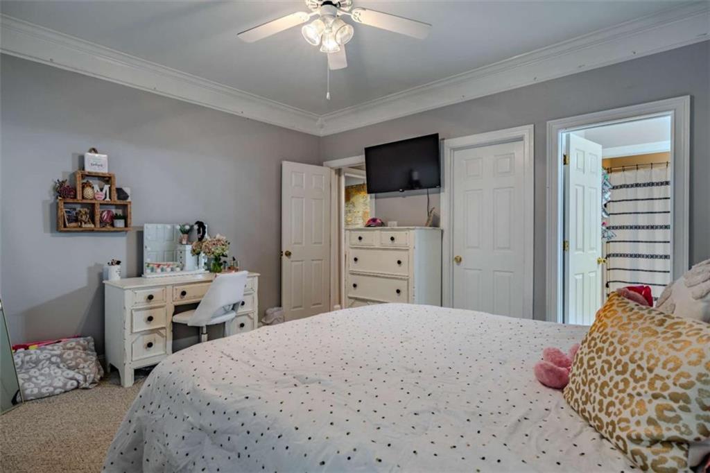 26 Saddlebrook Drive Rome, GA 30161 - Photo 49 of 63 a bedroom with a bed and furniture