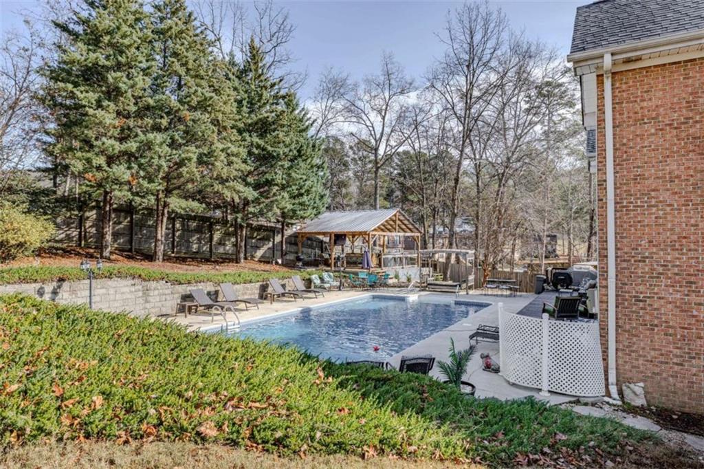 26 Saddlebrook Drive Rome, GA 30161 - Photo 53 of 63 a view of a house with backyard and sitting area