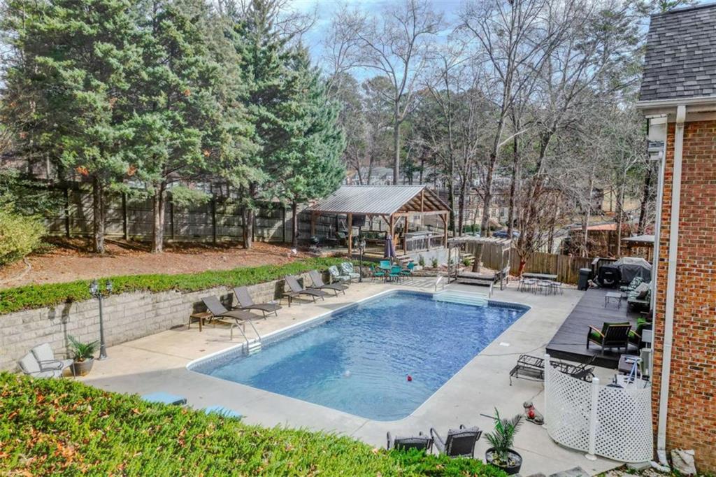 26 Saddlebrook Drive Rome, GA 30161 - Photo 6 of 63 a view of a backyard with sitting area