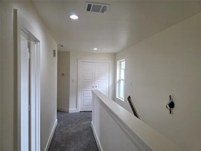a view of hallway with window