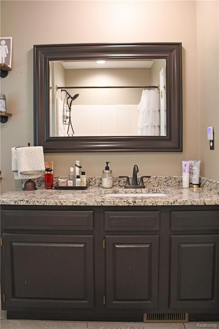 4805 Rabidue Road North Street, MI 48049 - Photo 23 of 29 UPSTAIRSBATH2.jpg