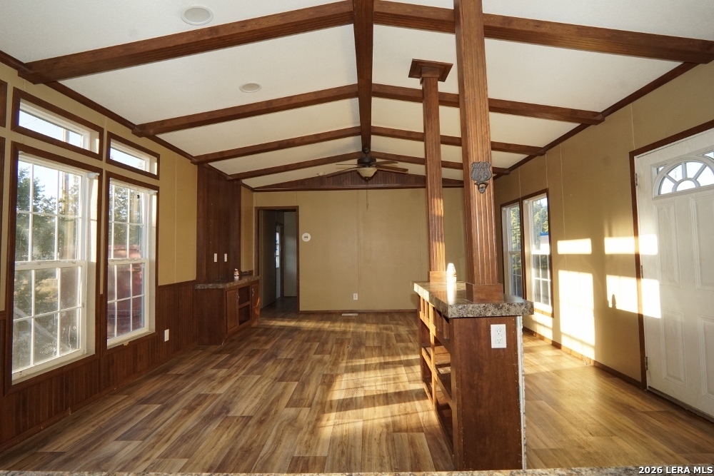 625 Pr 1517 Bandera, TX 78003 - Photo 18 of 18 a view of a hallway with wooden floor and windows
