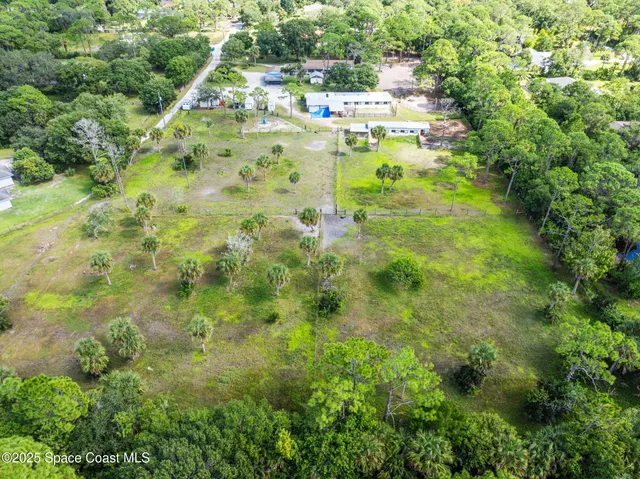 a kitchen with stainless steel appliances granite countertop a stove and cabinets