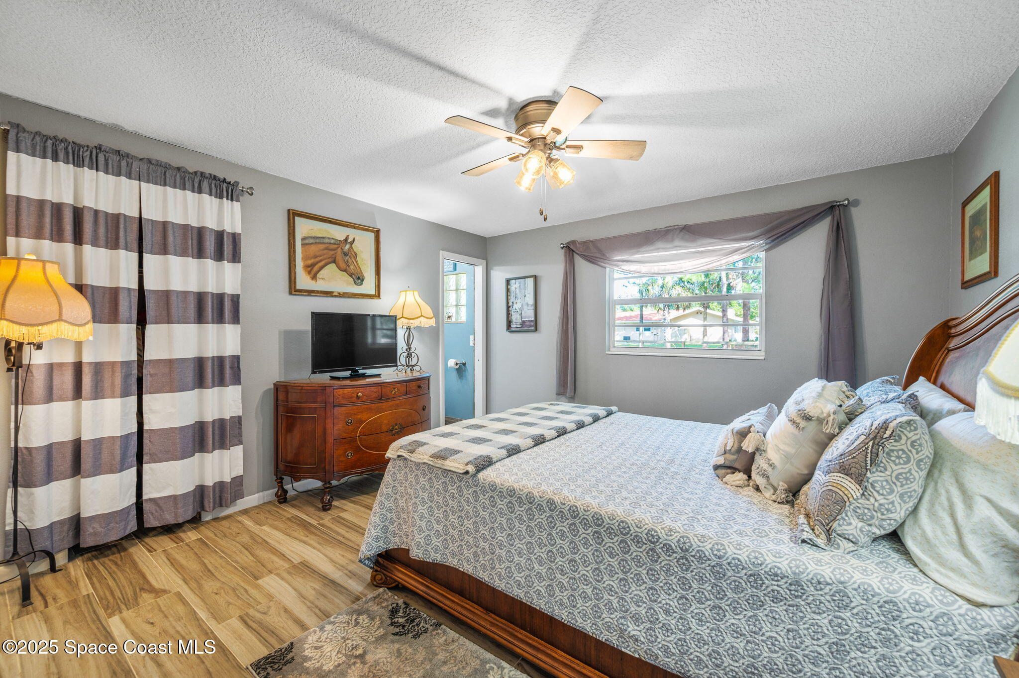 4505 Eldorado Way Melbourne, FL 32934 - Photo 33 of 78 a bedroom with a bed and a window