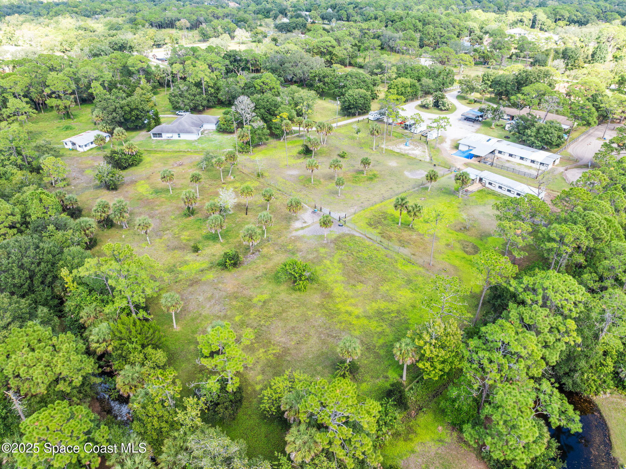 4505 Eldorado Way Melbourne, FL 32934 - Photo 54 of 78 a view of a big yard with lots of bushes
