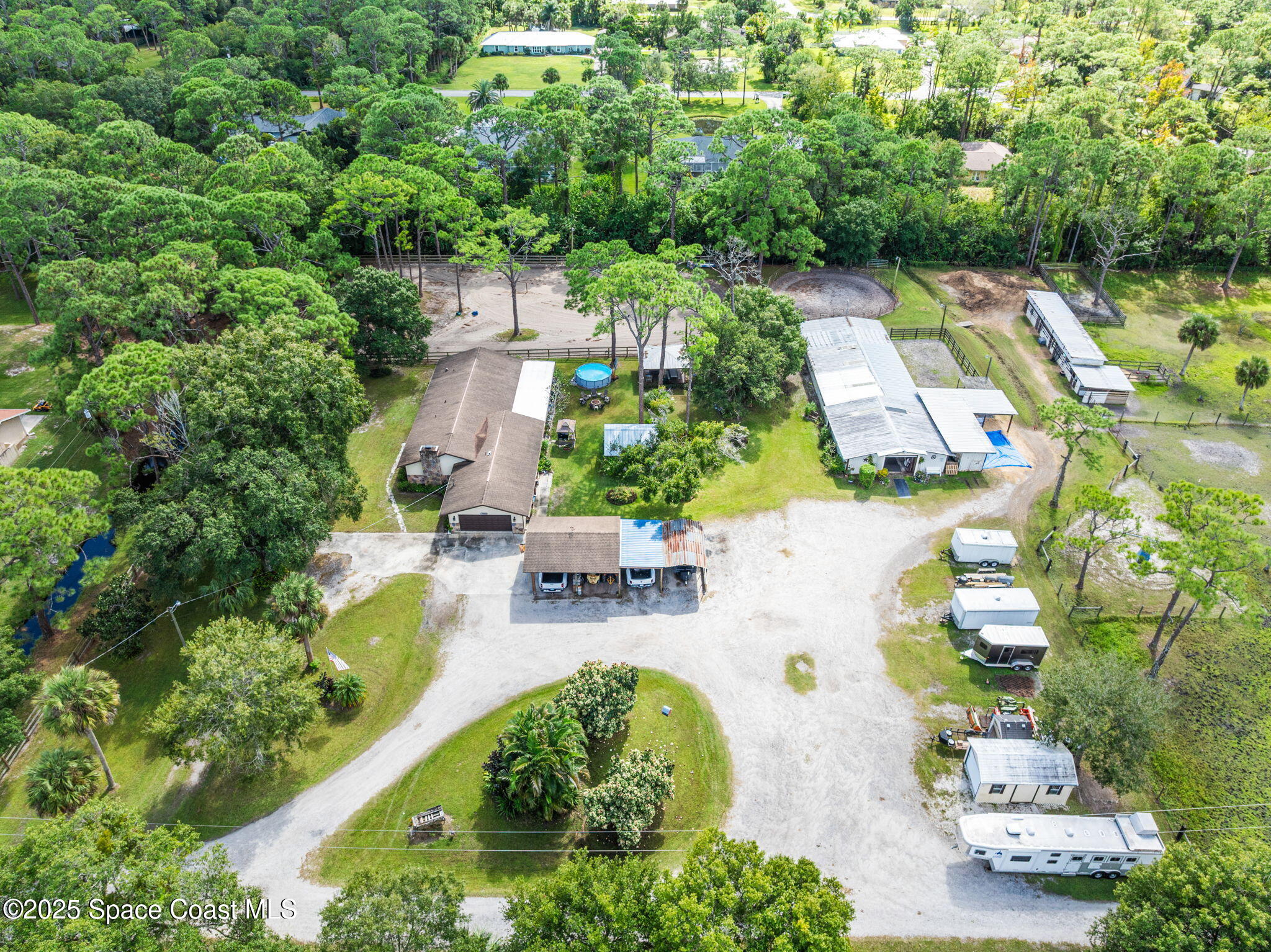 4505 Eldorado Way Melbourne, FL 32934 - Photo 57 of 78 an aerial view of a house with yard swimming pool and outdoor seating