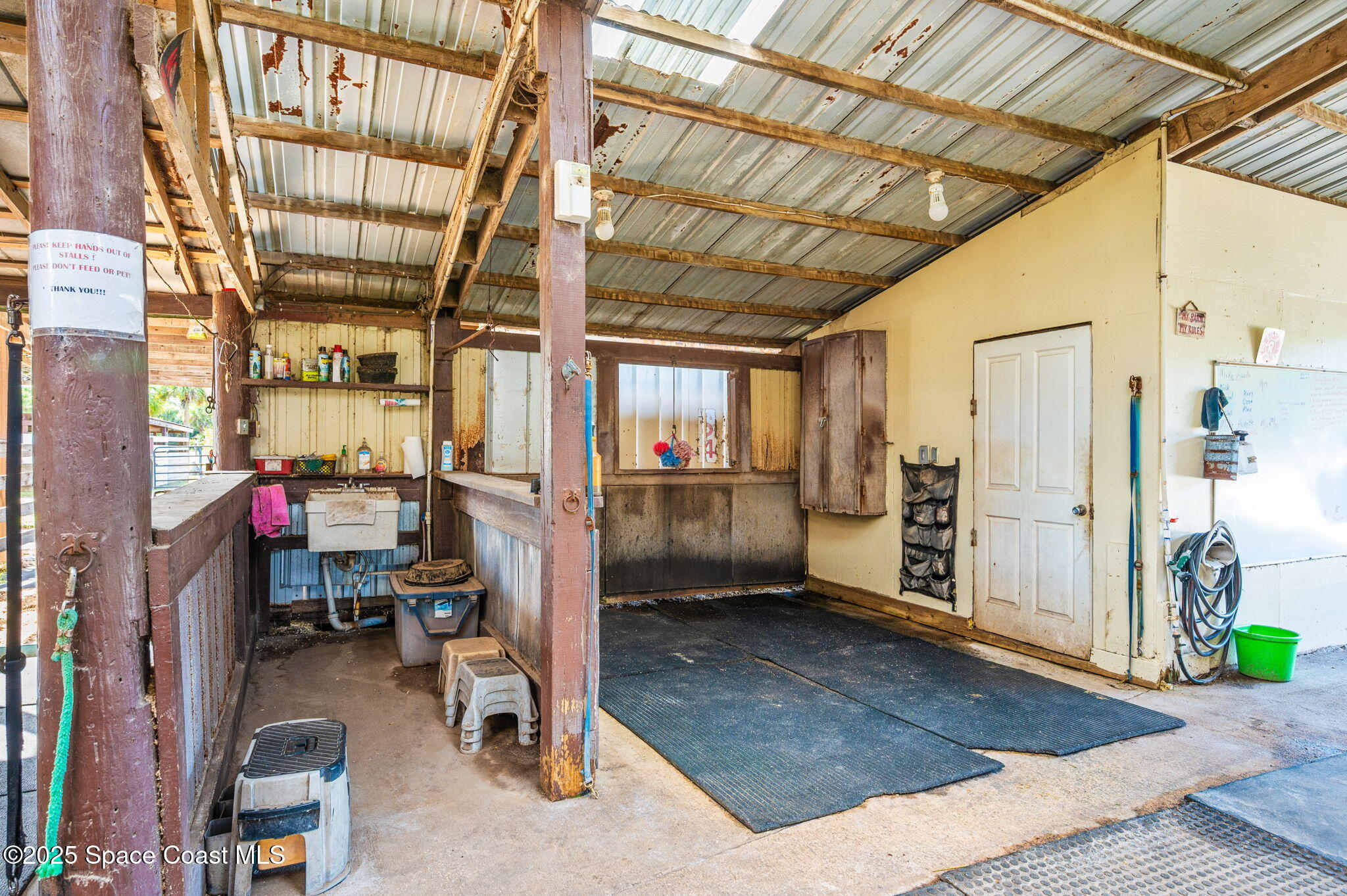 4505 Eldorado Way Melbourne, FL 32934 - Photo 69 of 78 a view of a room with gym equipment