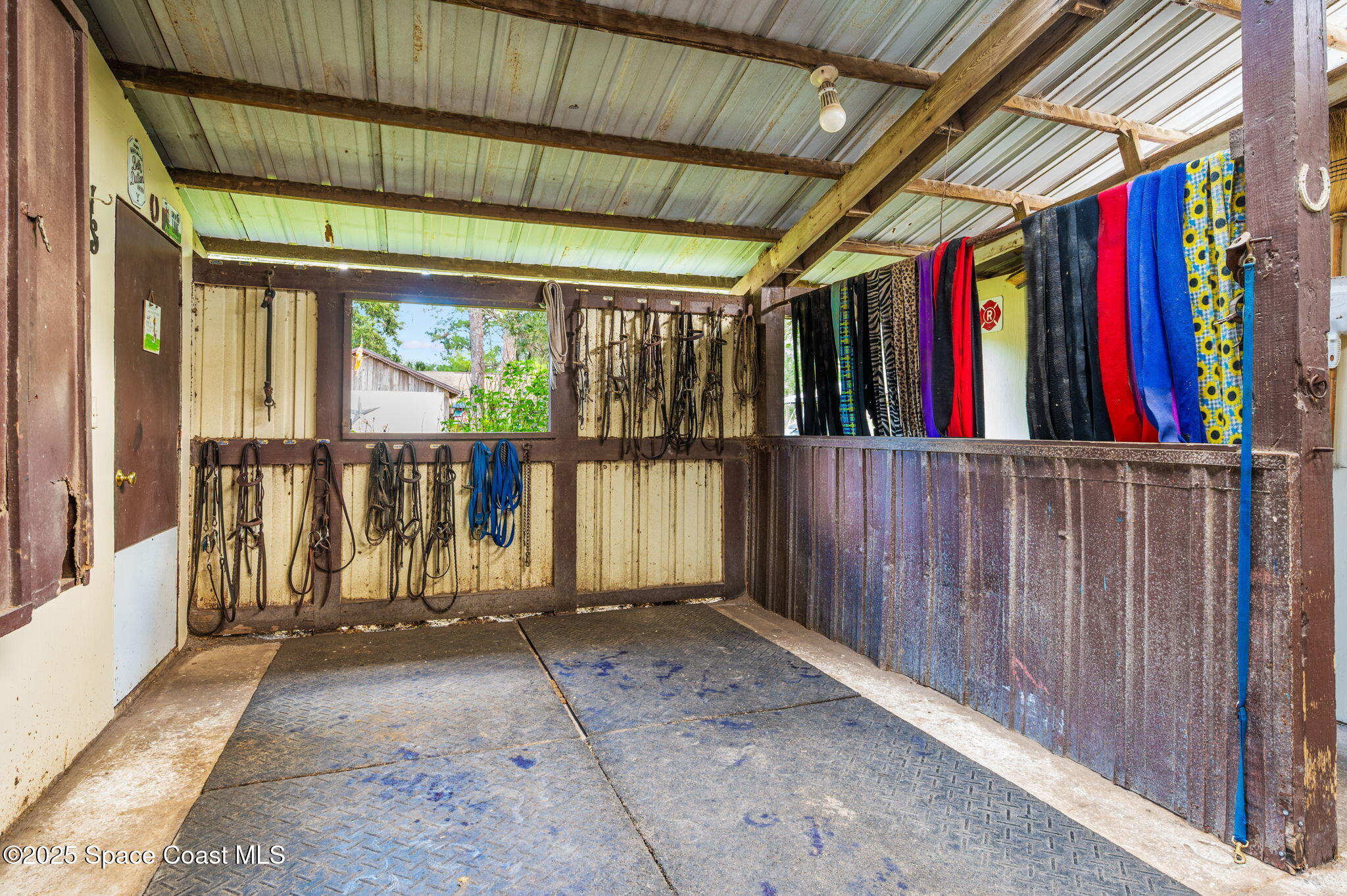 4505 Eldorado Way Melbourne, FL 32934 - Photo 70 of 78 a view of a porch with wooden floor and stairs
