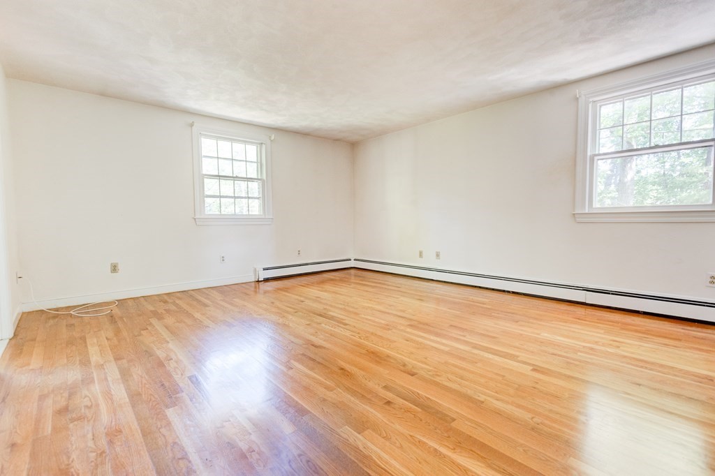 44 Colgate Road Needham, MA 02492 - Photo 16 of 30 a view of empty room with wooden floor and fan