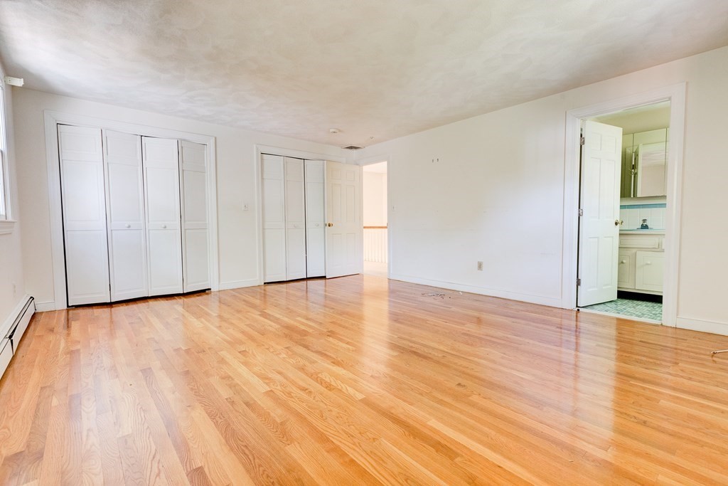 44 Colgate Road Needham, MA 02492 - Photo 17 of 30 a view of an empty room with wooden floor