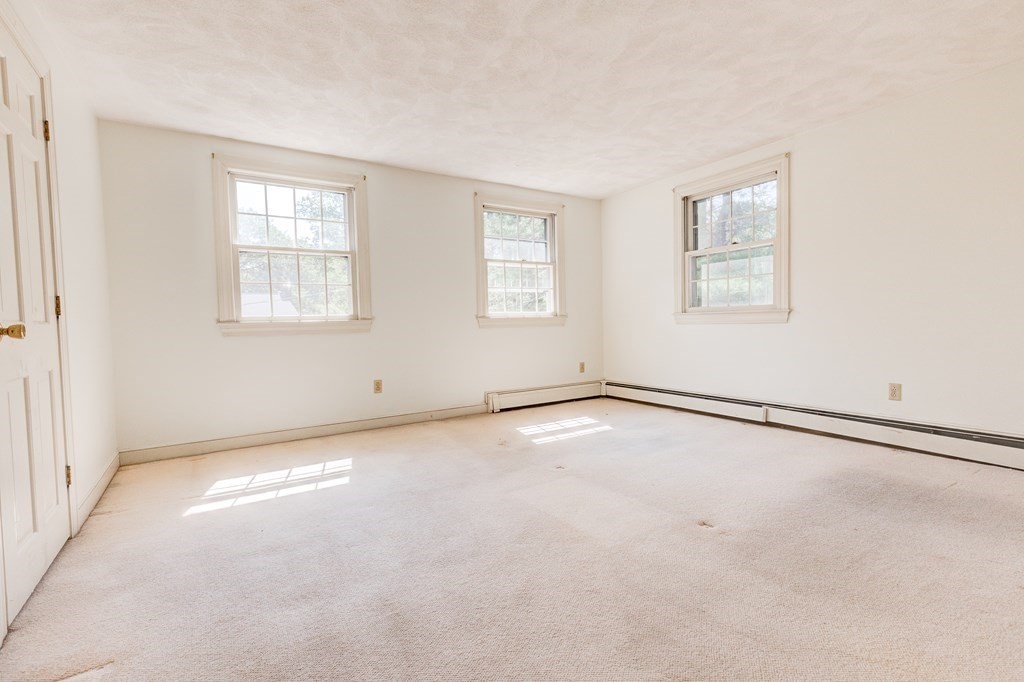 44 Colgate Road Needham, MA 02492 - Photo 18 of 30 a view of an empty room with a window