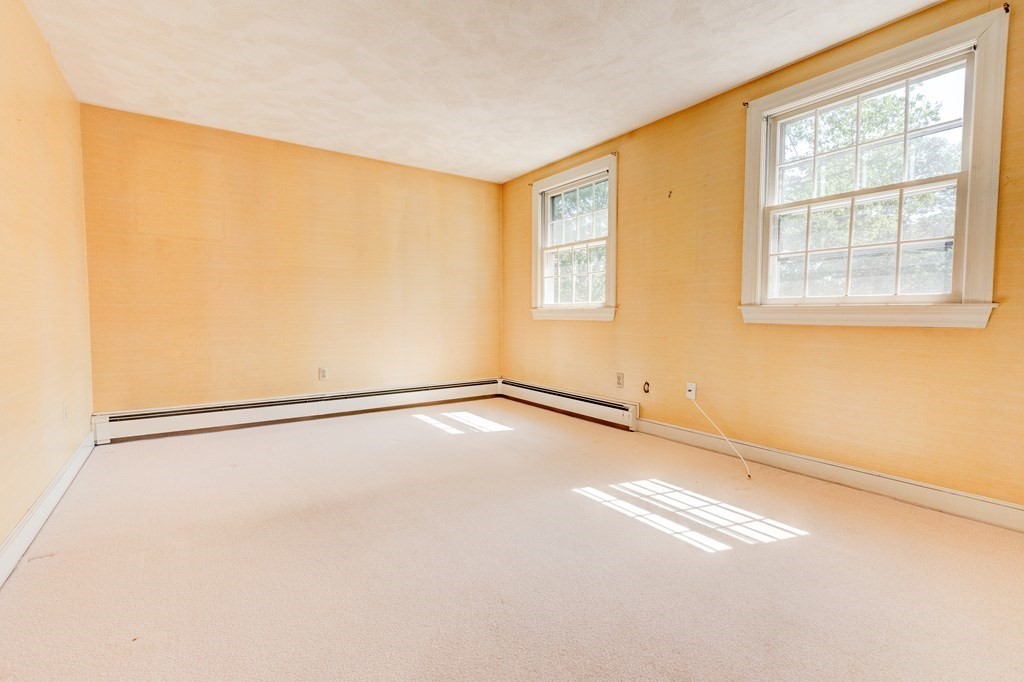 44 Colgate Road Needham, MA 02492 - Photo 19 of 30 a view of an empty room with a window