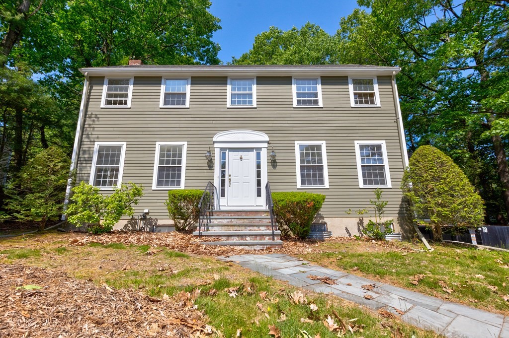 44 Colgate Road Needham, MA 02492 - Photo 2 of 30 a front view of a house with garden