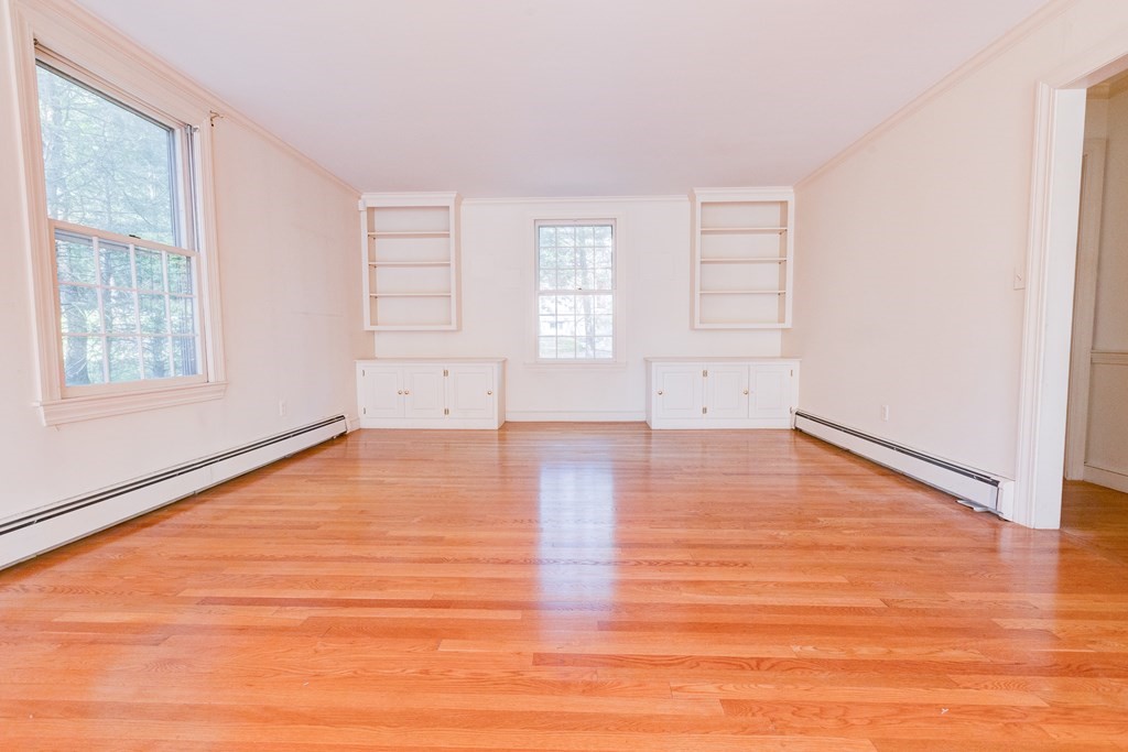 44 Colgate Road Needham, MA 02492 - Photo 30 of 30 an empty room with wooden floor and windows