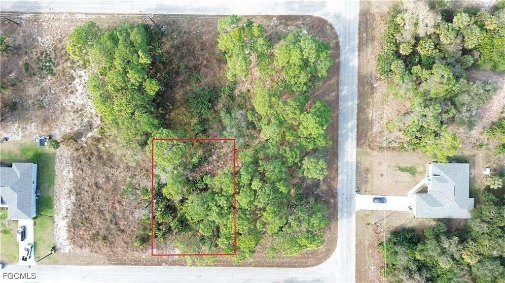 613 Marcella Street LaBelle, FL 33935 - Photo 2 of 5 an outdoor view from a window