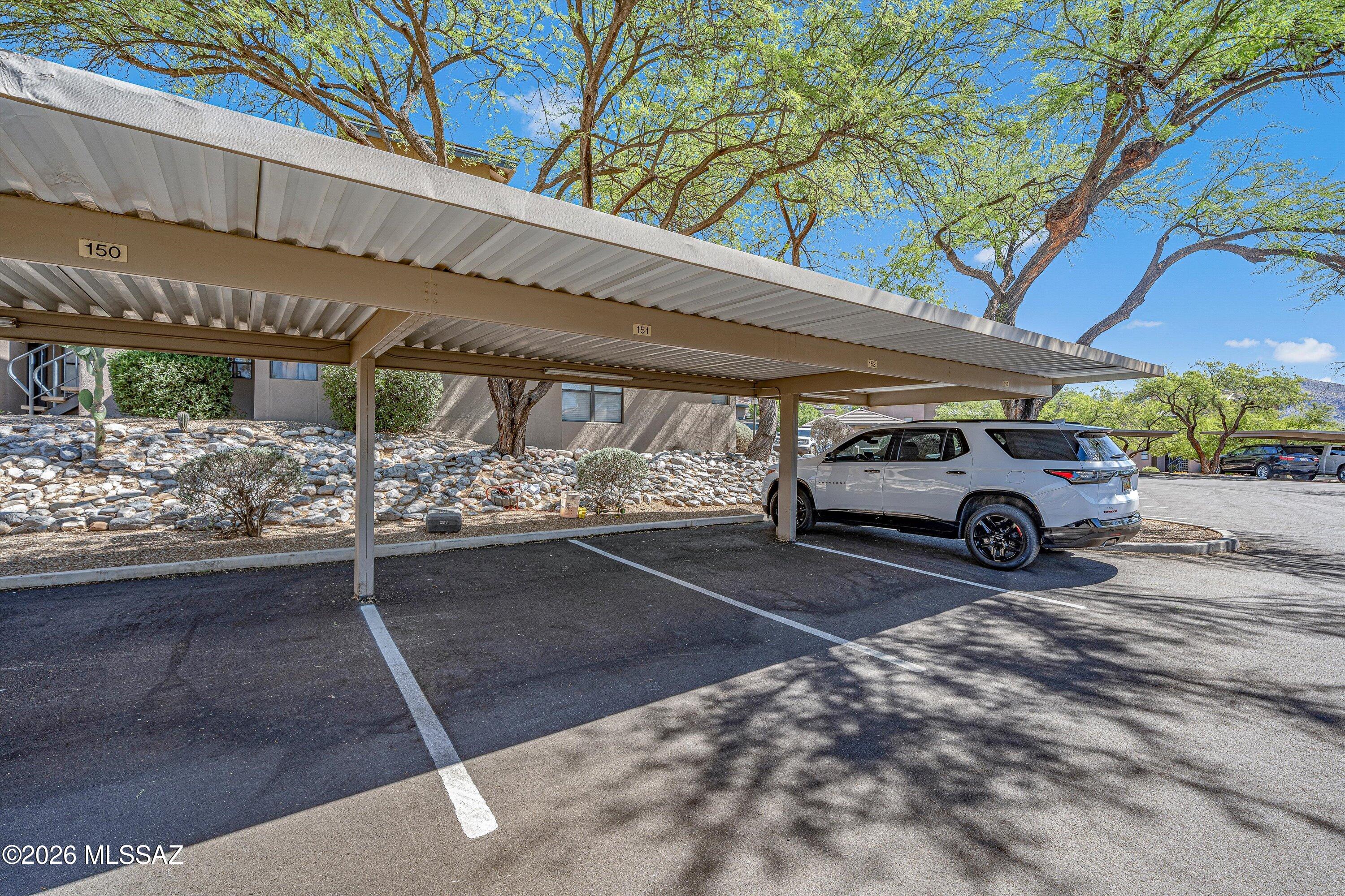 5800 North Kolb Road, Unit 1102 Tucson, AZ 85750 - Photo 21 of 36 a view of a car parked in front of a building