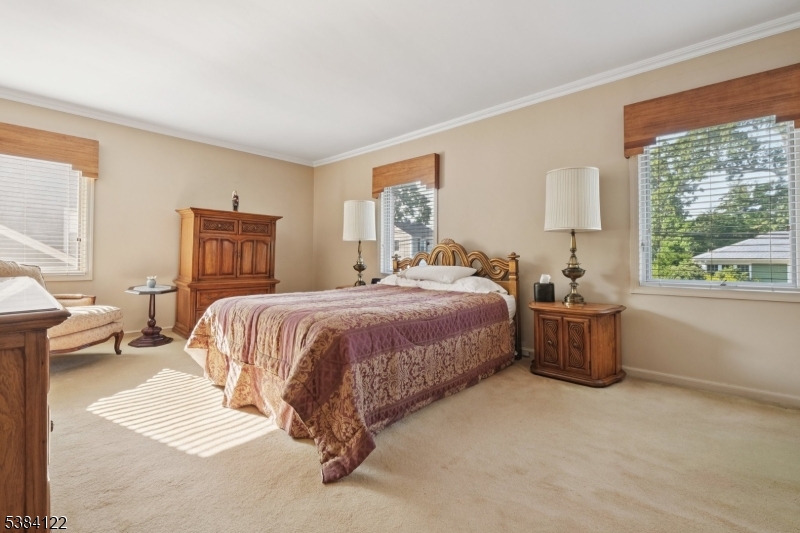 20 Kew Drive Springfield, NJ 07081 - Photo 14 of 19 a bedroom with a bed and a large window