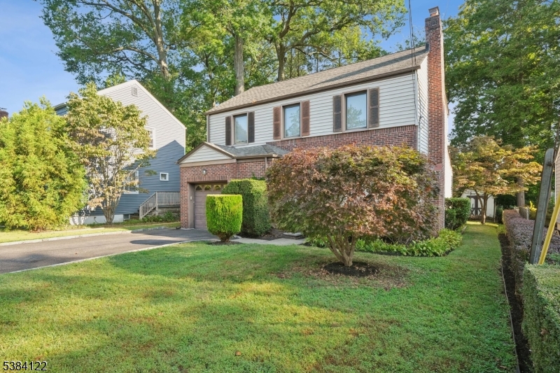 20 Kew Drive Springfield, NJ 07081 - Photo 2 of 19 a front view of a house with a yard