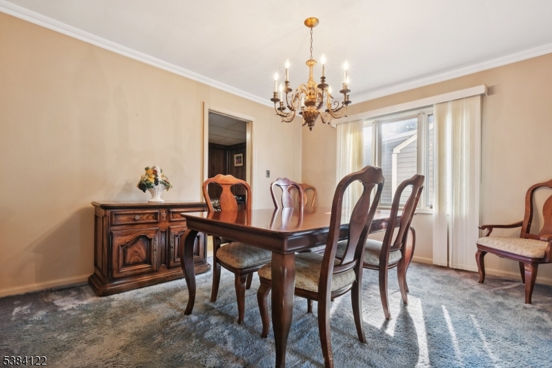 20 Kew Drive Springfield, NJ 07081 - Photo 5 of 19 a view of a dining room with furniture and chandelier