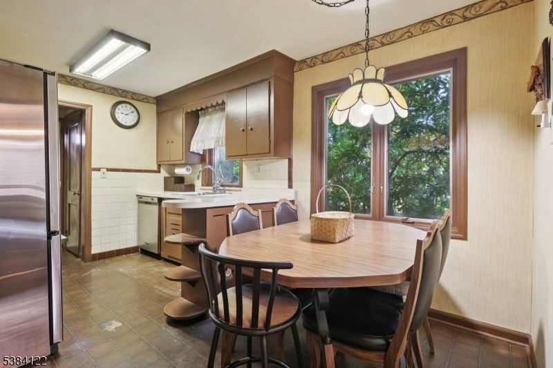 20 Kew Drive Springfield, NJ 07081 - Photo 7 of 19 a view of a dining room with furniture window and outside view