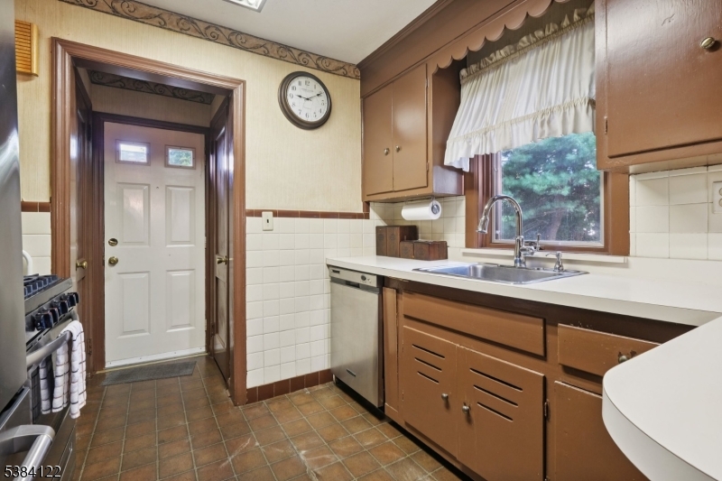 20 Kew Drive Springfield, NJ 07081 - Photo 8 of 19 a kitchen with a sink cabinets and appliances
