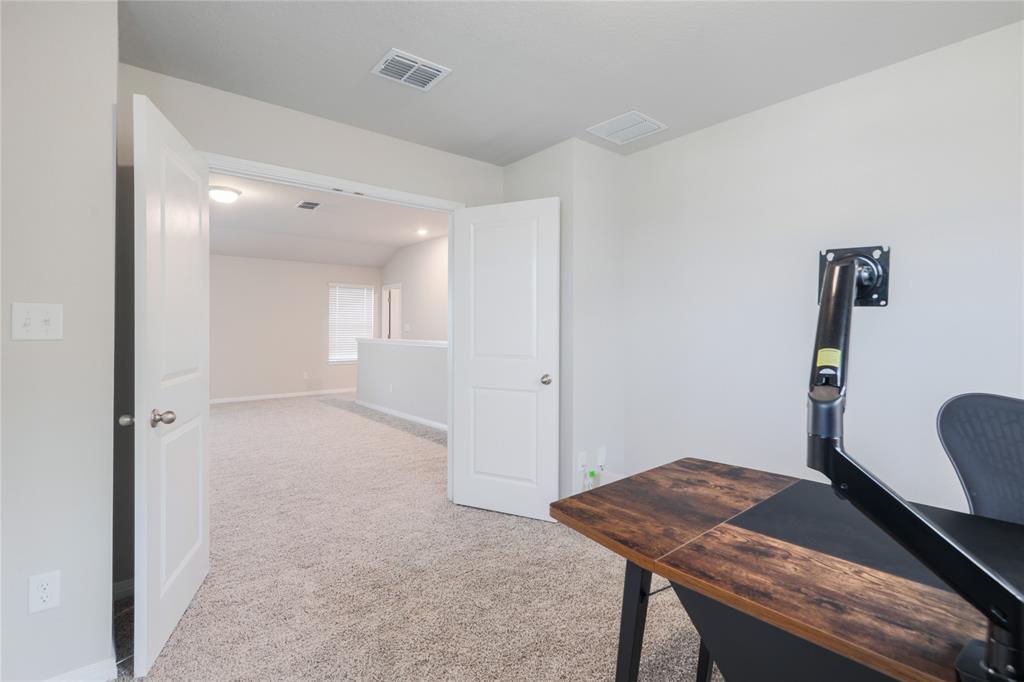 2815 Haystack Lane Round Rock, TX 78665 - Photo 20 of 30 Office area featuring light carpet and baseboards