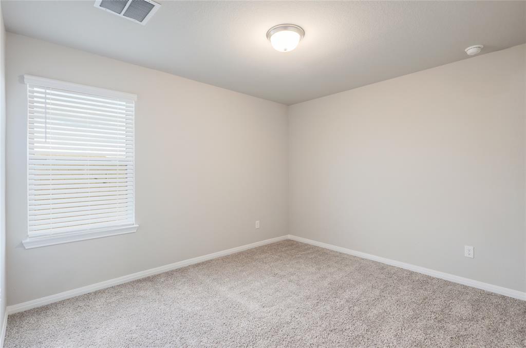 2815 Haystack Lane Round Rock, TX 78665 - Photo 24 of 30 Carpeted empty room featuring baseboards