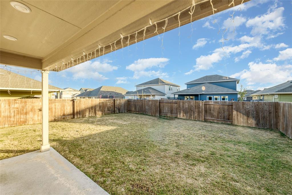 2815 Haystack Lane Round Rock, TX 78665 - Photo 28 of 30 Fenced backyard with a patio area and a residential view