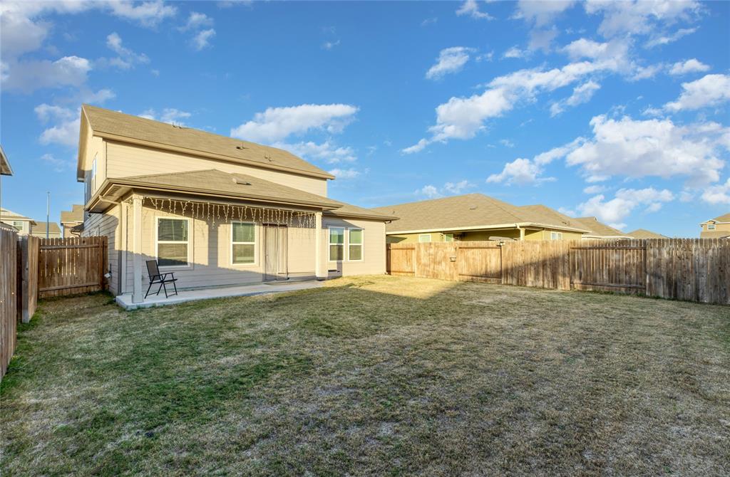 2815 Haystack Lane Round Rock, TX 78665 - Photo 29 of 30 Rear view of property with a fenced backyard and a patio