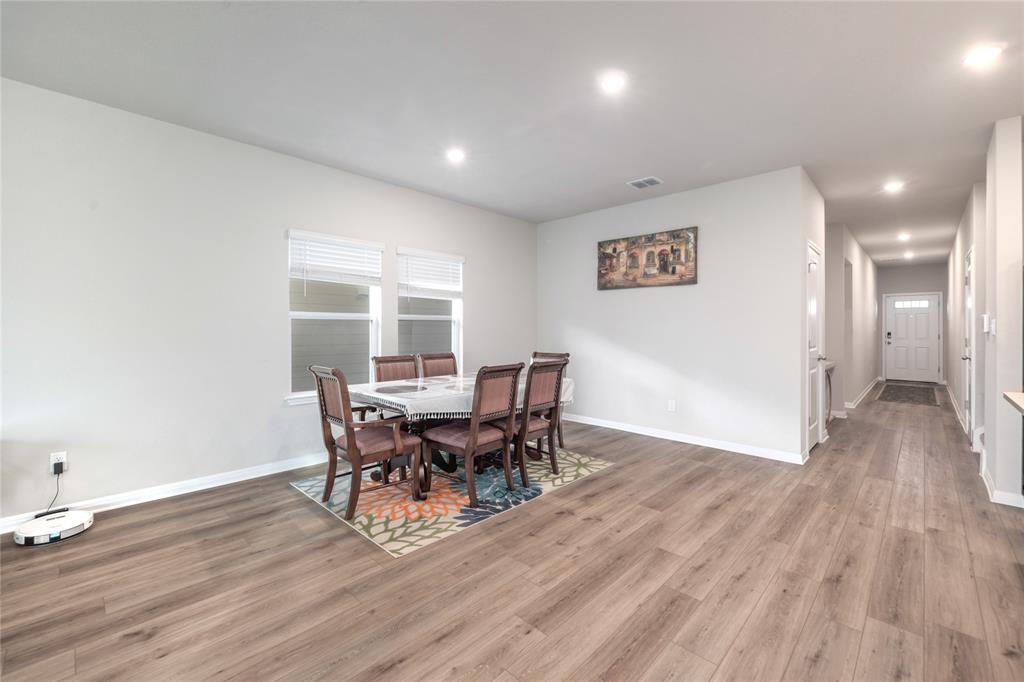 2815 Haystack Lane Round Rock, TX 78665 - Photo 4 of 30 Dining space with light wood finished floors and recessed lighting