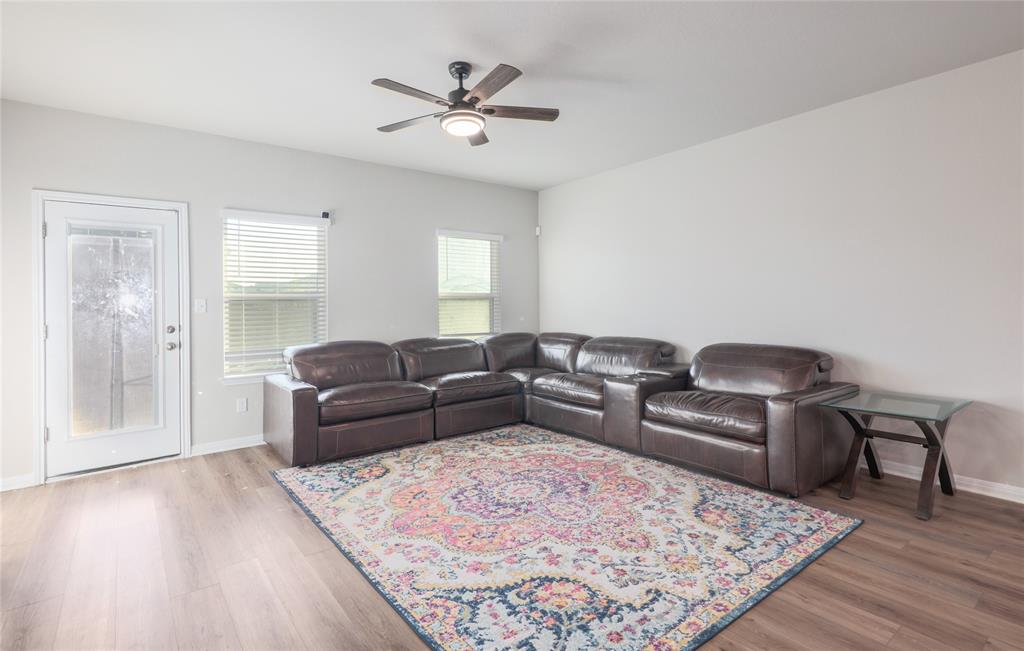 2815 Haystack Lane Round Rock, TX 78665 - Photo 6 of 30 Living area featuring light wood-style floors and ceiling fan