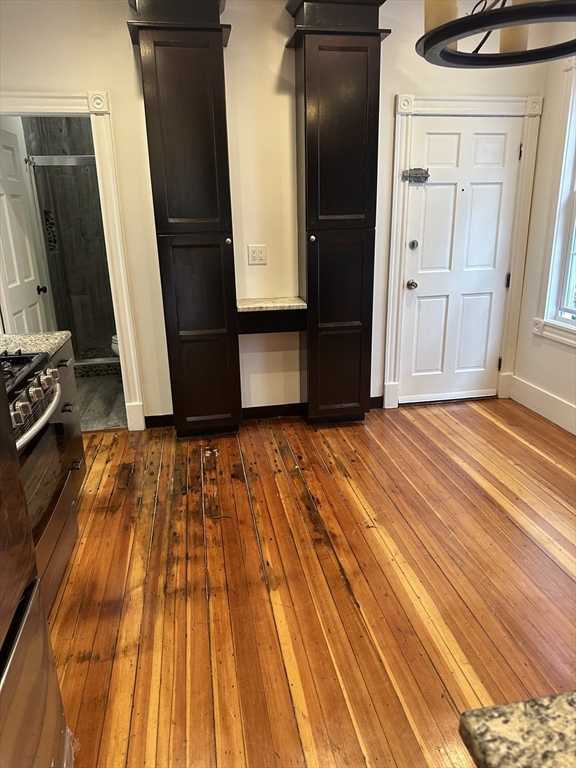 10 Dalrymple Street, Unit 2 Boston, MA 02130 - Photo 2 of 13 a view of front door with wooden floor
