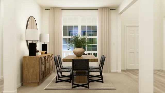 a dining room with furniture and windows