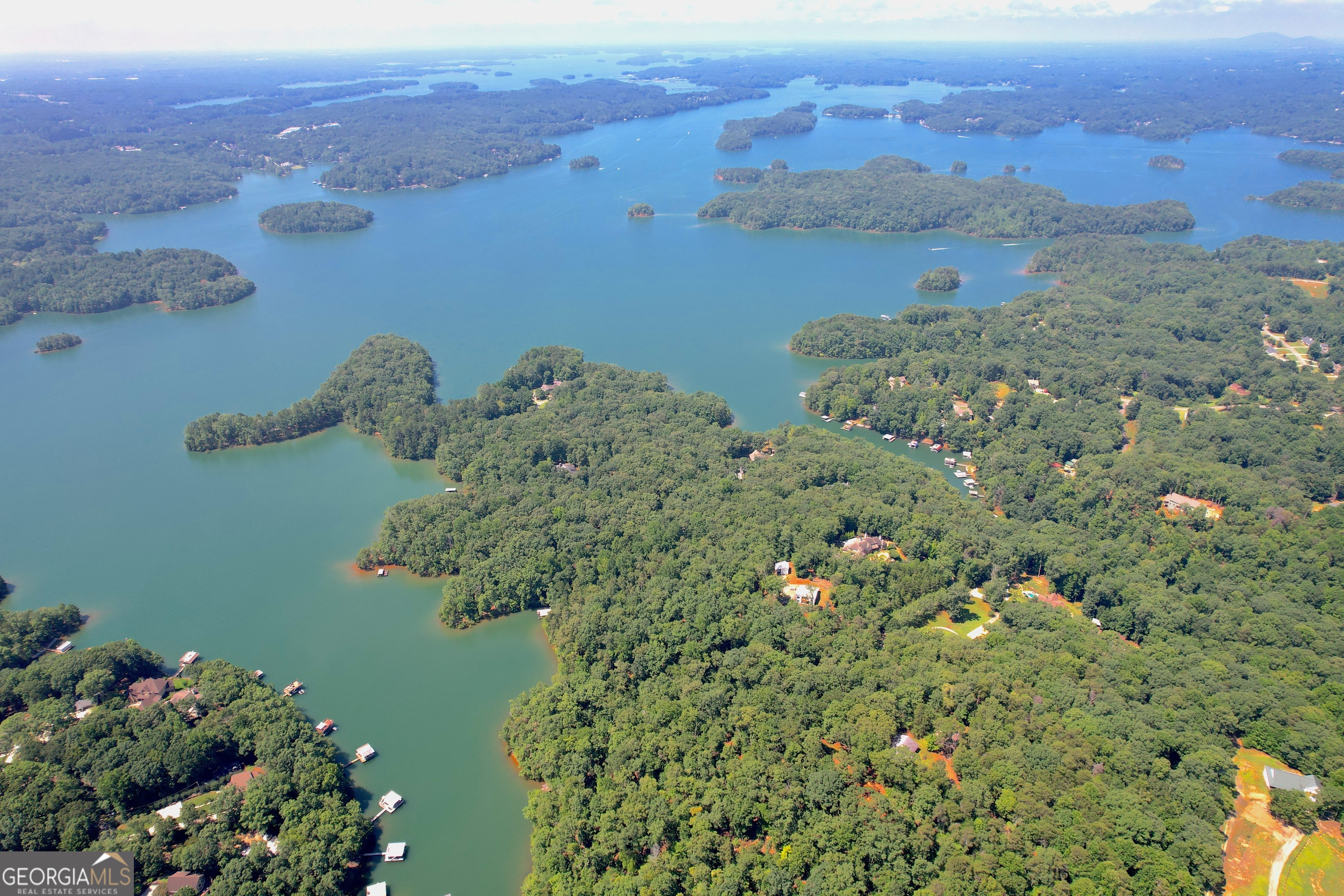 3475 Cook Road Gainesville, GA 30506 - Photo 11 of 29 a view of a lake with a mountain in the background
