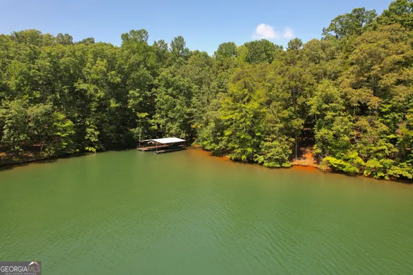 a view of a lake with a deck