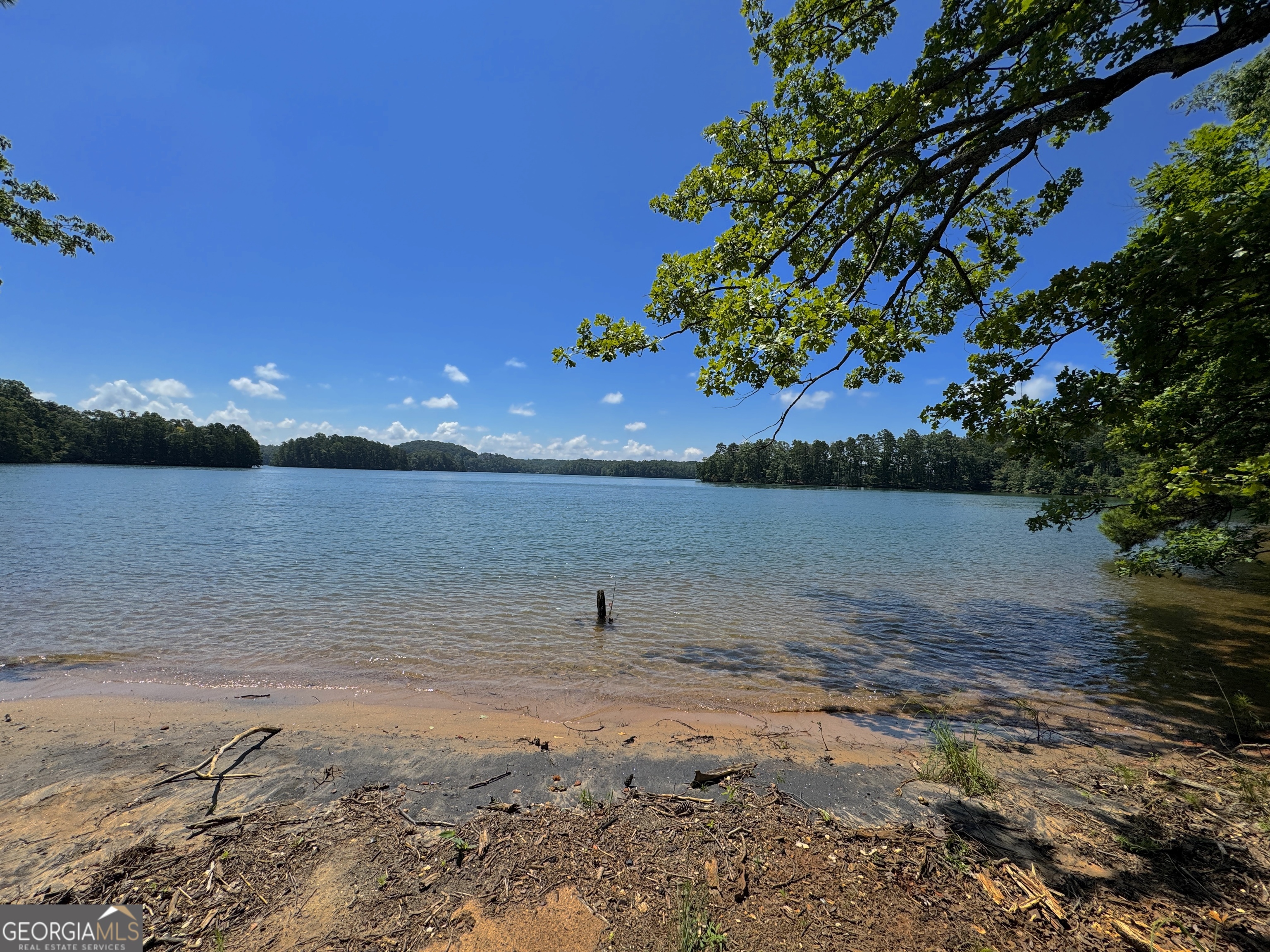 3475 Cook Road Gainesville, GA 30506 - Photo 27 of 29 a view of a lake with beach and city view