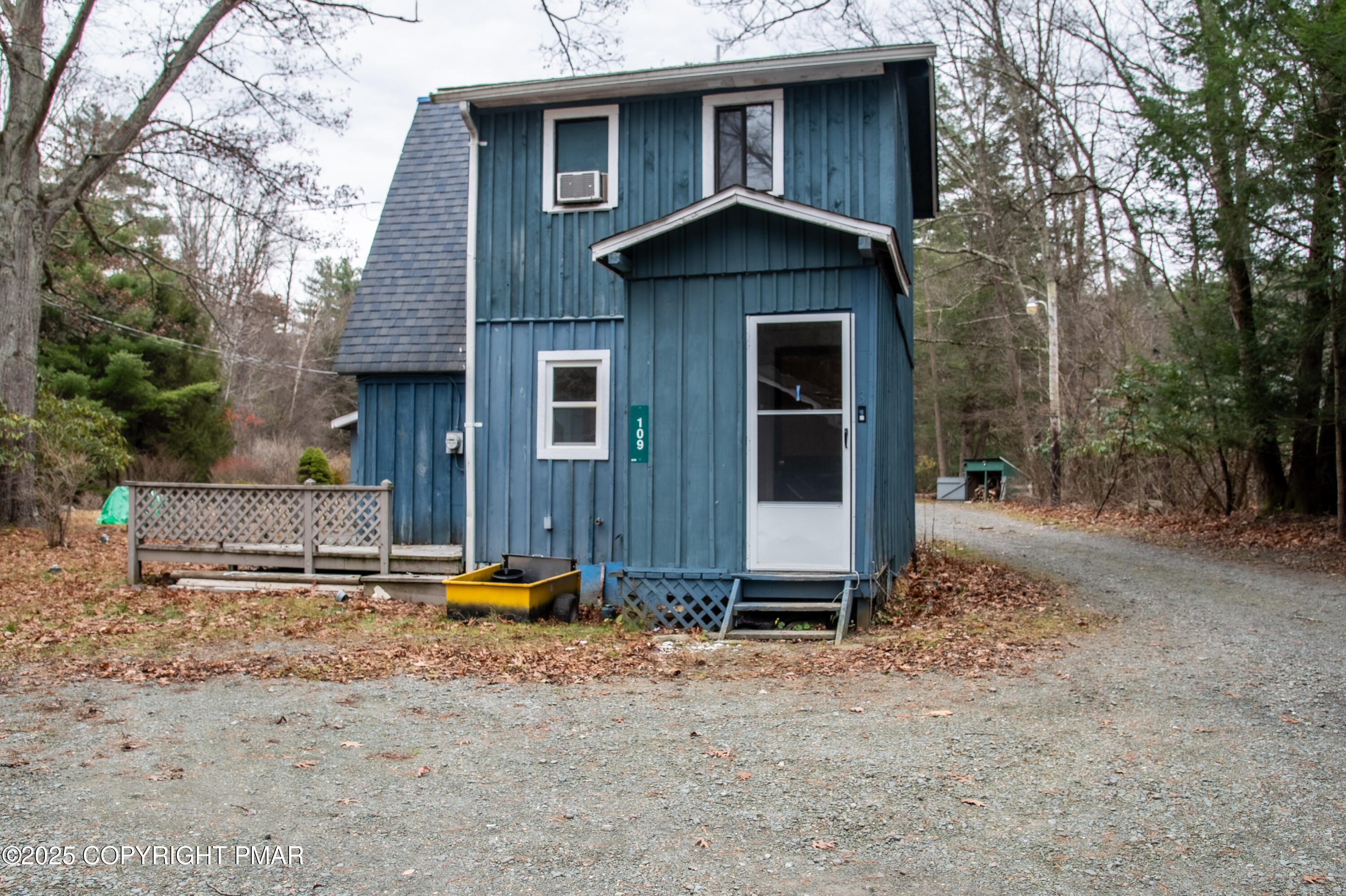 111 Rippling Brook Road Canadensis, PA 18325 - Photo 11 of 50 a backyard of a house with barbeque oven and trees