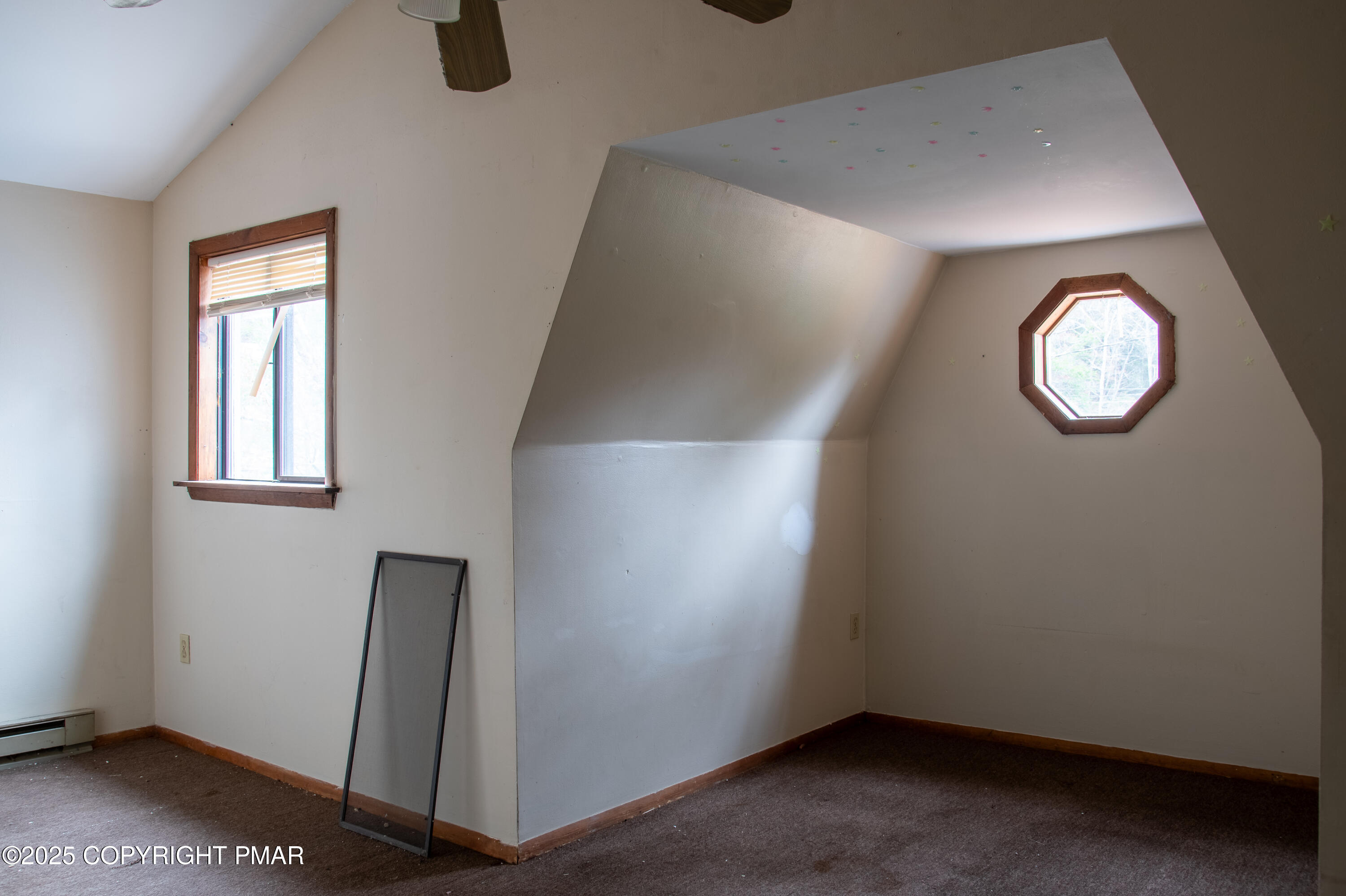 111 Rippling Brook Road Canadensis, PA 18325 - Photo 14 of 50 an empty room with a door