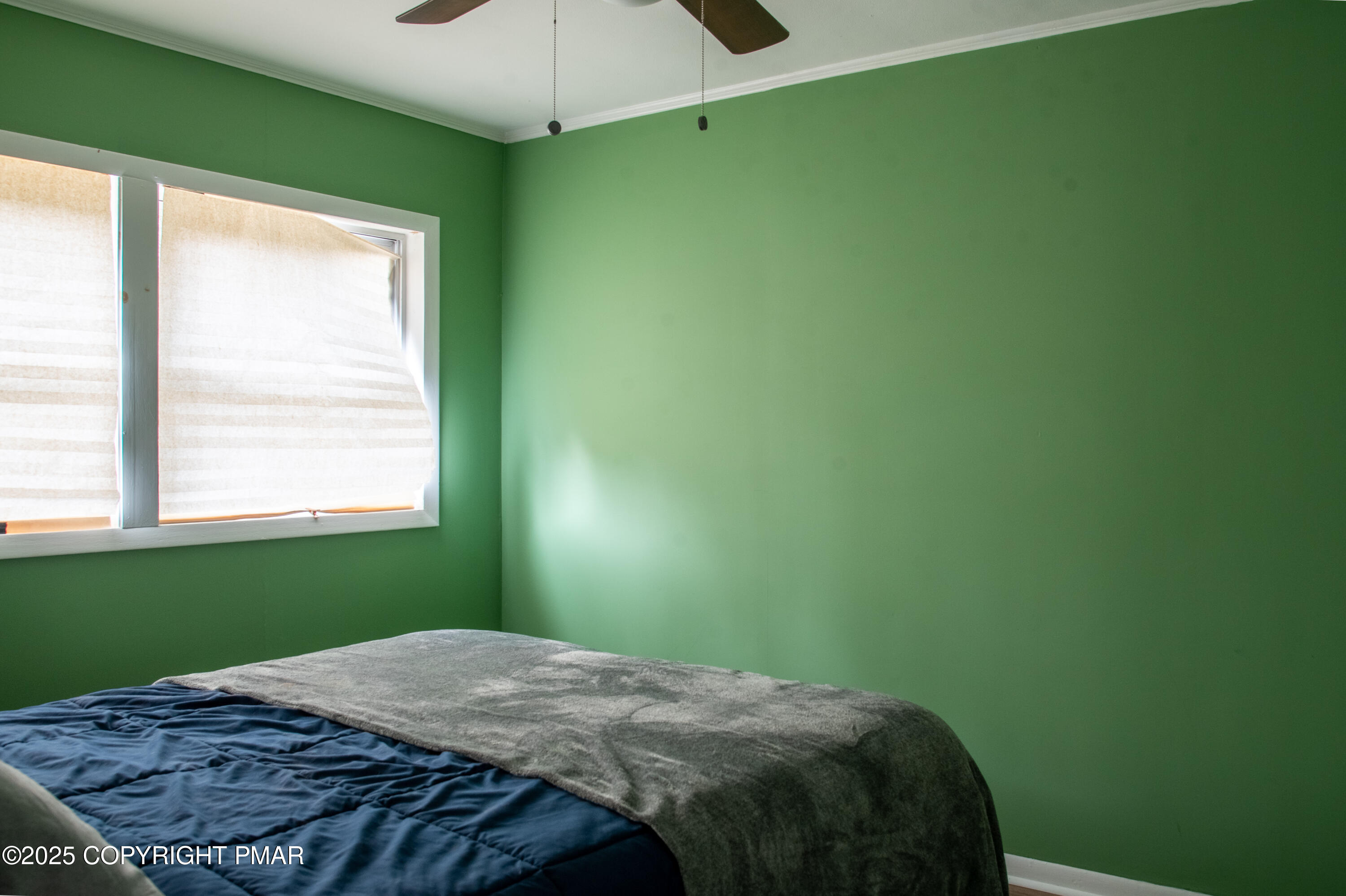 111 Rippling Brook Road Canadensis, PA 18325 - Photo 35 of 50 a bedroom with a bed and a window