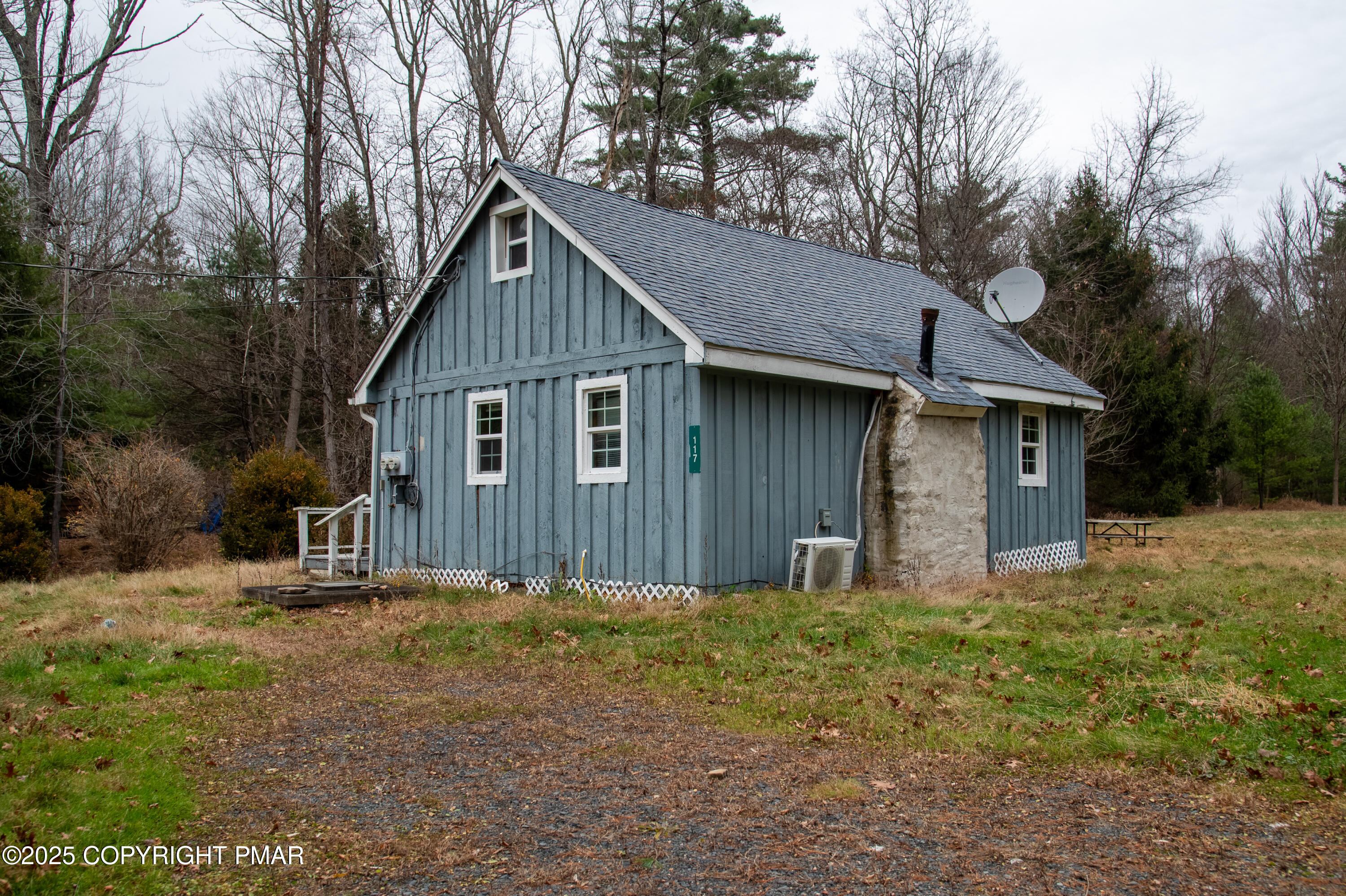 111 Rippling Brook Road Canadensis, PA 18325 - Photo 38 of 50 a house with trees in the background