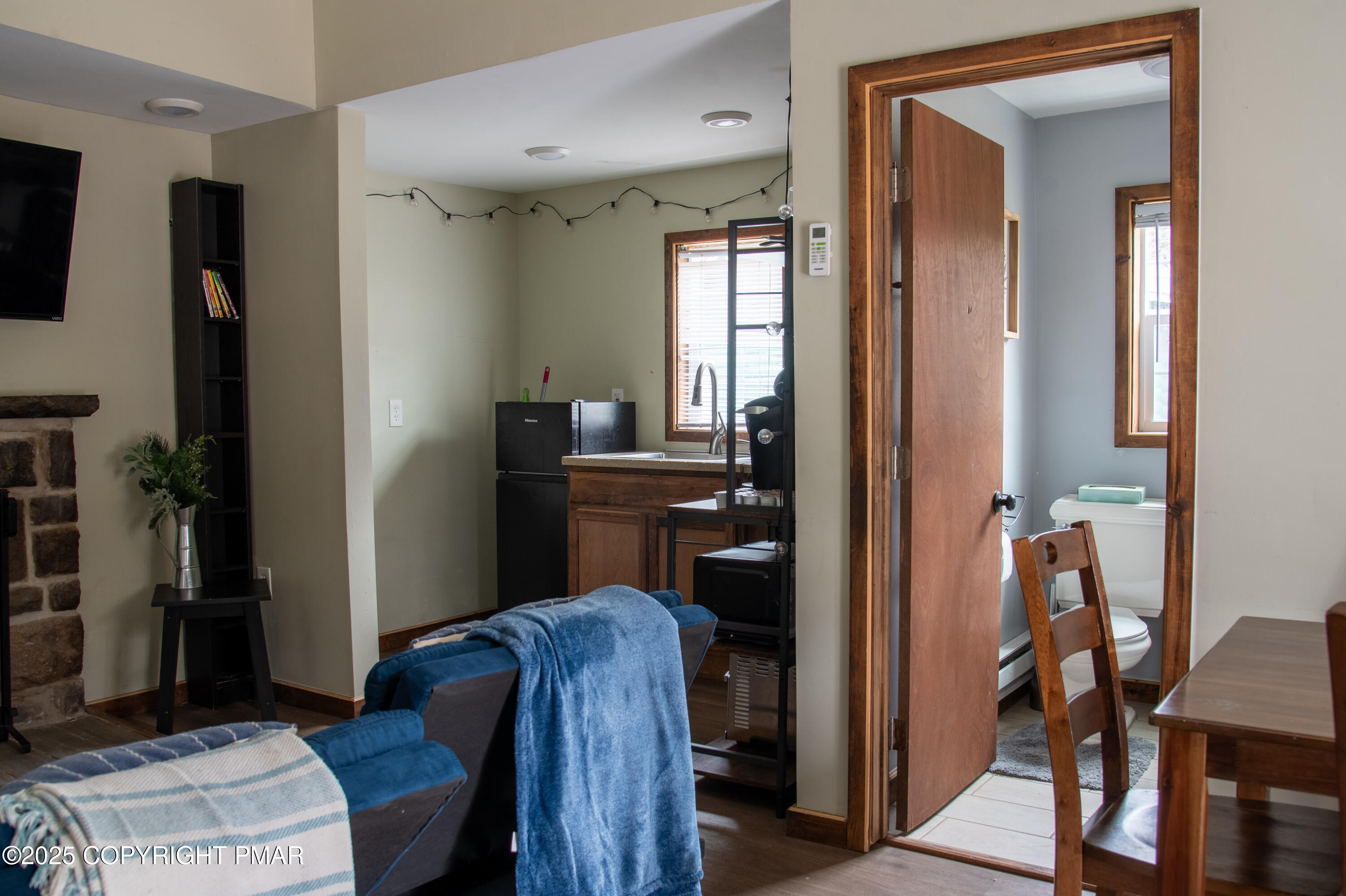 111 Rippling Brook Road Canadensis, PA 18325 - Photo 40 of 50 a view of a livingroom with furniture and windows