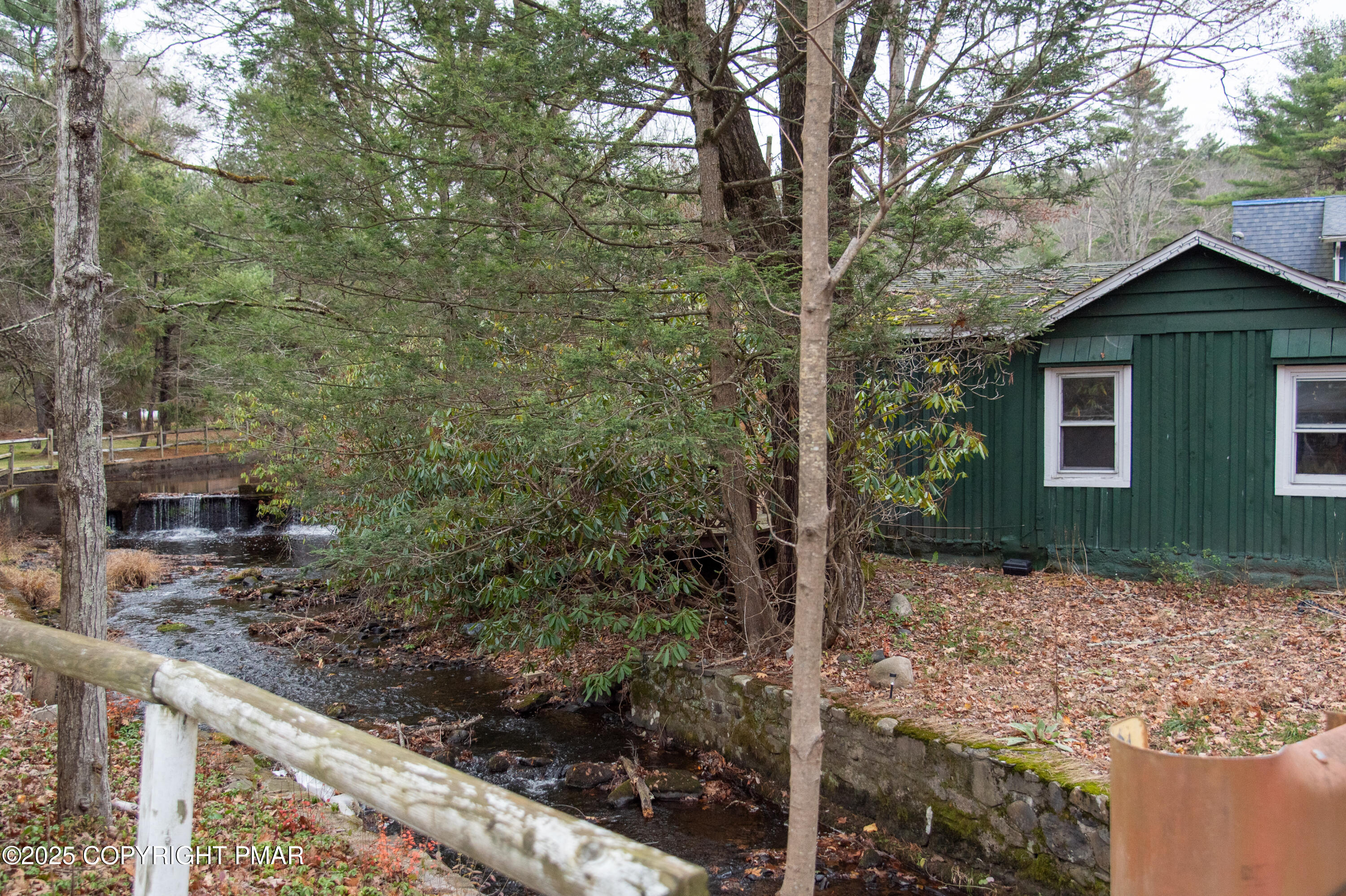 111 Rippling Brook Road Canadensis, PA 18325 - Photo 49 of 50 a view of a house with a yard