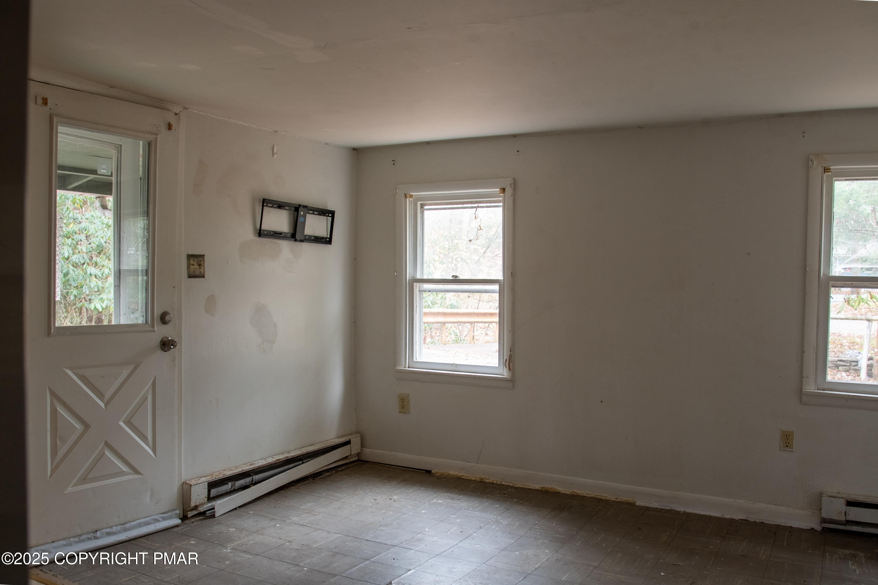 111 Rippling Brook Road Canadensis, PA 18325 - Photo 5 of 50 an empty room with windows