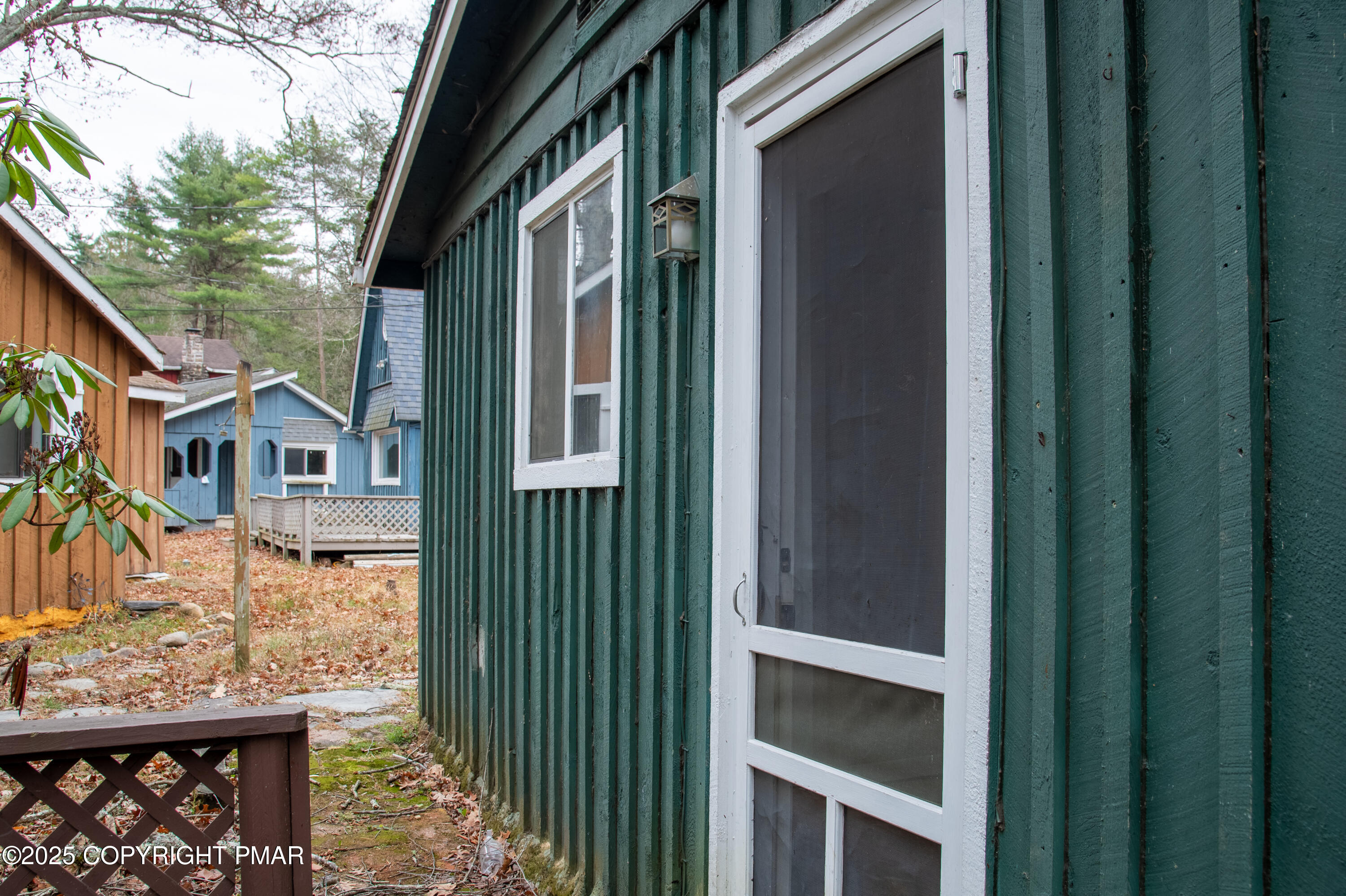 111 Rippling Brook Road Canadensis, PA 18325 - Photo 8 of 50 a view of a house with a wooden fence