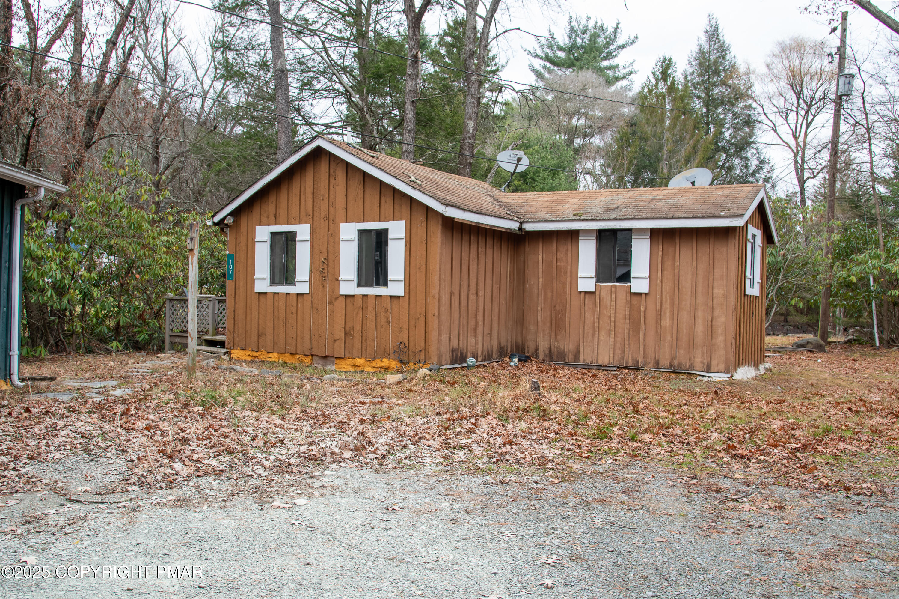 111 Rippling Brook Road Canadensis, PA 18325 - Photo 10 of 50 a house with trees in the background