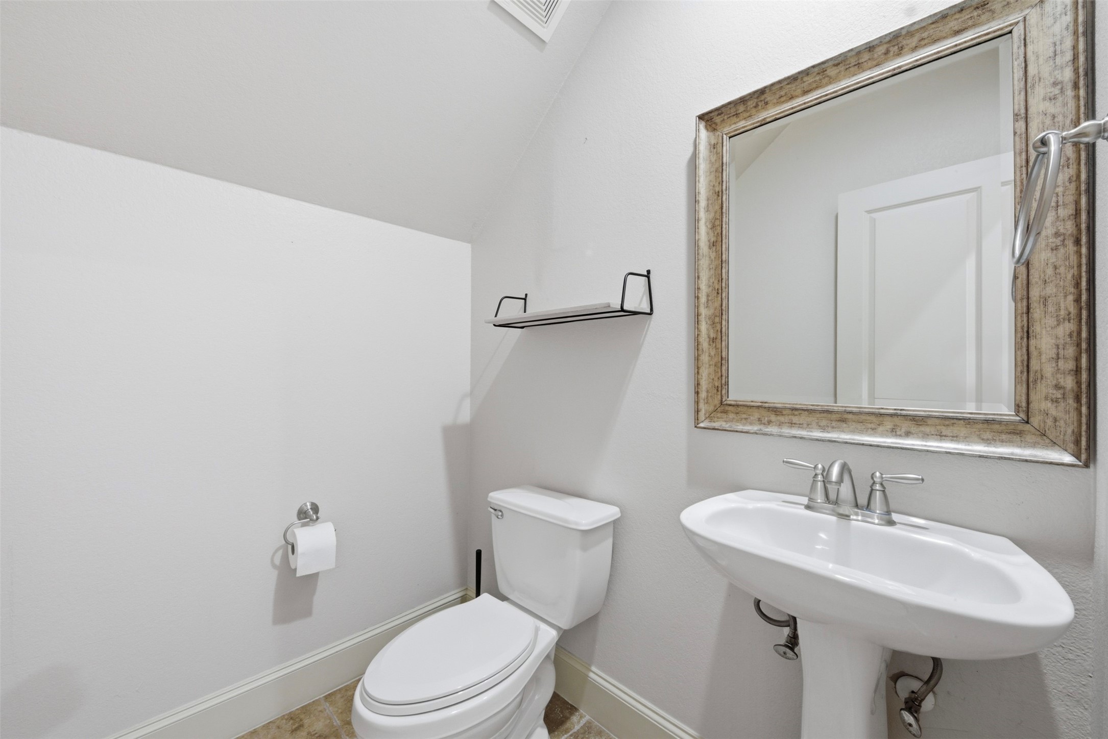 5929 Kansas Street Houston, TX 77007 - Photo 8 of 30 Half bath located downstairs