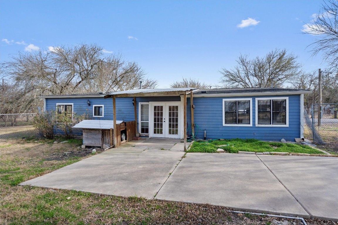 2203 Windy Hill Road Kyle, TX 78640 - Photo 26 of 29 a front view of a house with a yard and outdoor seating