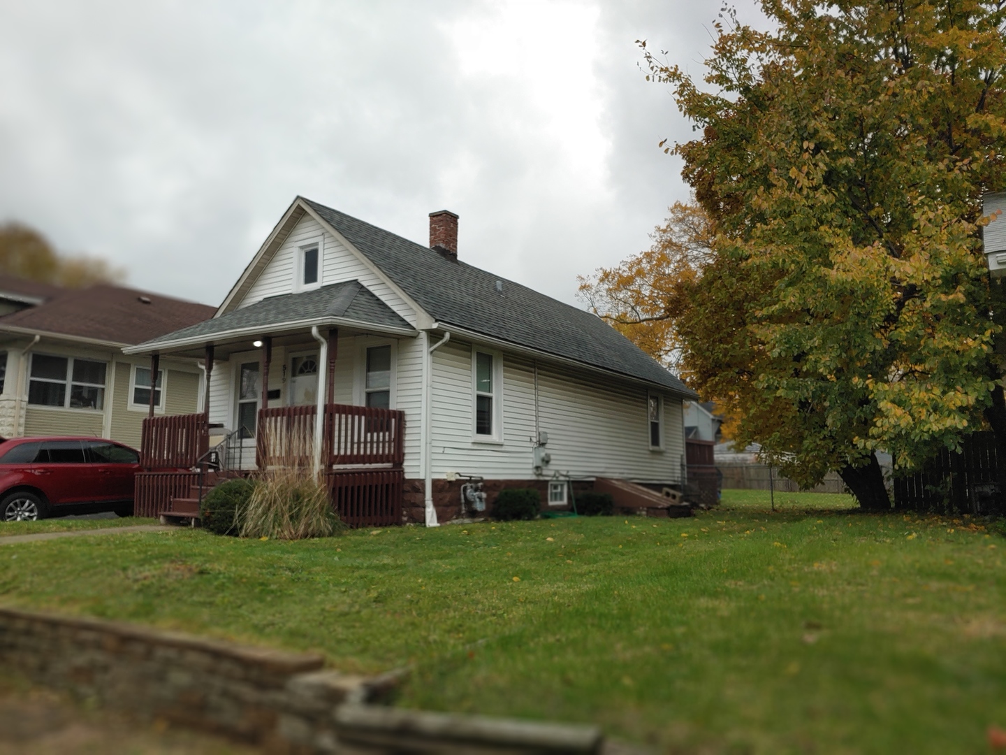 519 Prospect Place Joliet, IL 60436 - Photo 2 of 15 a front view of house with a garden