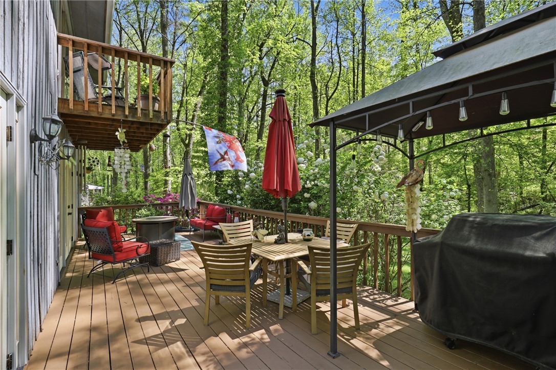110 Shaftsbury Road Clemson, SC 29631 - Photo 22 of 38 This spacious wooden deck offers abundant outdoor living space, perfect for entertaining or quiet enjoyment.